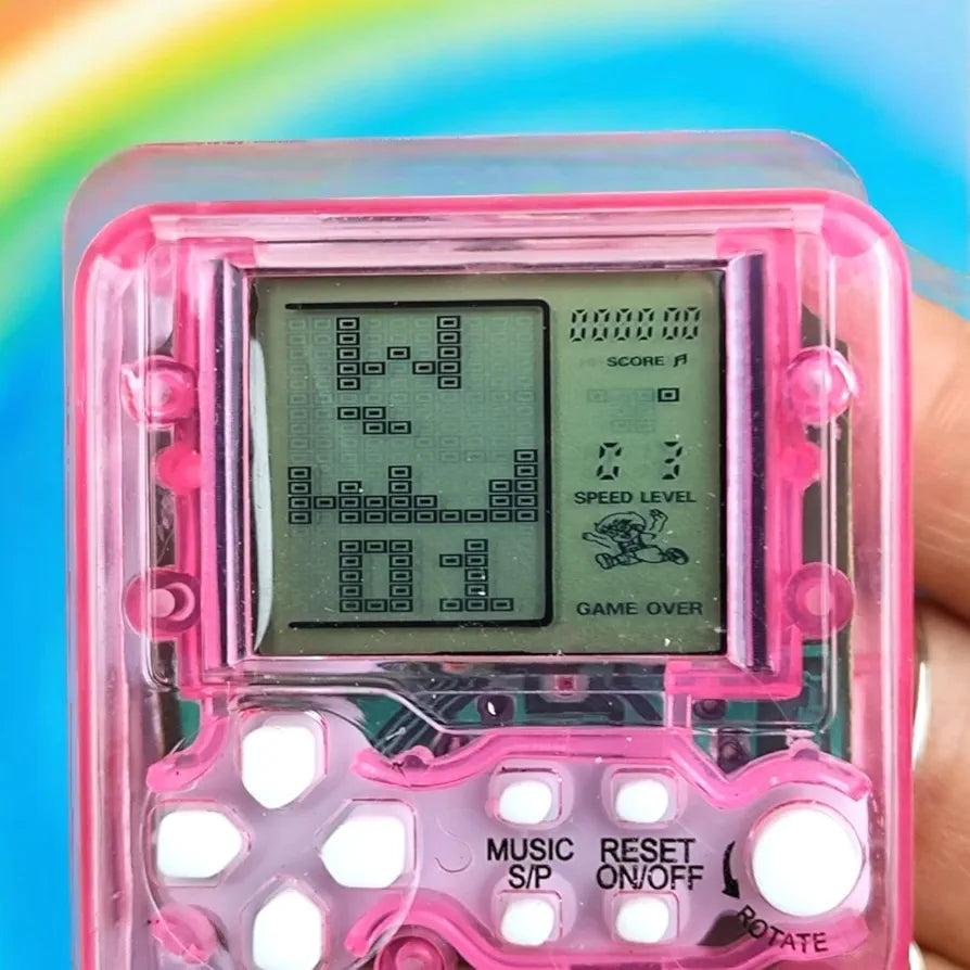 Mini Game Chaveiro Jogos Classicos Retro A Pilha Eletronico Crianças Presente Nostalgico Cores Rosa/Roxo