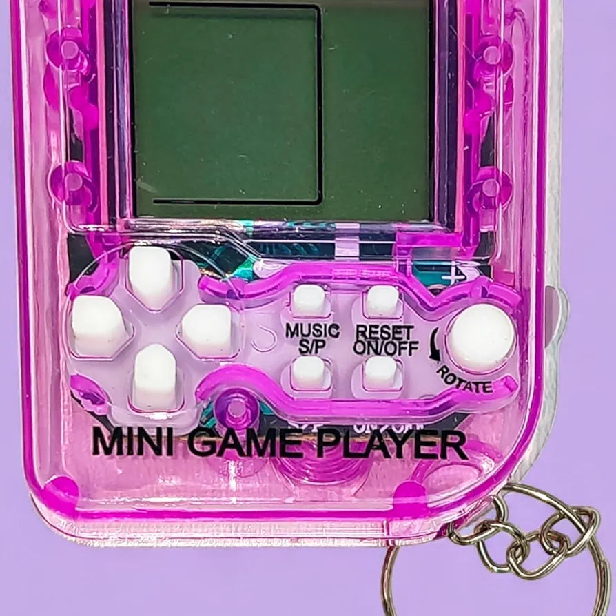 Mini Game Chaveiro Jogos Classicos Retro A Pilha Eletronico Crianças Presente Nostalgico Cores Rosa/Roxo